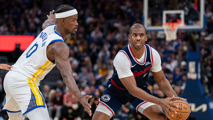 Oct 28, 2025; San Francisco, California, USA; LA Clippers guard Chris Paul prepares to pass the basketball against Golden State Warriors forward Jimmy Butler III (10) during the third quarter at Chase Center. Mandatory Credit: Neville E. Guard-Imagn Images Oct 28, 2025; San Francisco, California, USA; LA Clippers guard Chris Paul prepares to pass the basketball against Golden State Warriors forward Jimmy Butler III (10) during the third quarter at Chase Center. Mandatory Credit: Neville E. Guard-Imagn Images