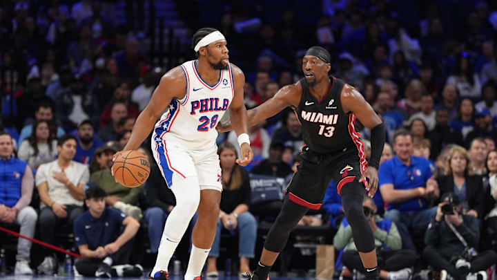 Philadelphia 76ers forward Guerschon Yabusele controls the ball against Miami Heat center Bam Adebayo. Mandatory Credit: Kyle Ross-Imagn Images