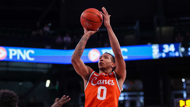 Mar 4, 2025; Atlanta, Georgia, USA; Miami Hurricanes guard Matthew Cleveland (0) shoots against the Georgia Tech Yellow Jackets in the first half at McCamish Pavilion. Mandatory Credit: Brett Davis-Imagn Images
