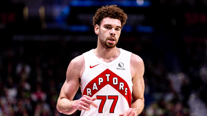 Nov 27, 2024; New Orleans, Louisiana, USA;  Toronto Raptors forward Jamison Battle (77) looks on against the New Orleans Pelicans during the second half at Smoothie King Center. Mandatory Credit: Stephen Lew-Imagn Images
