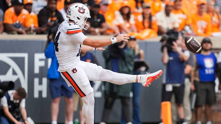 Auburn punter Hudson Kaak (14) punts the ball during a college football game between Tennessee and Auburn at Neyland Stadium in Knoxville, Tenn., on Oct. 3, 2026. Auburn punter Hudson Kaak (14) punts the ball during a college football game between Tennessee and Auburn at Neyland Stadium in Knoxville, Tenn., on Oct. 3, 2026.