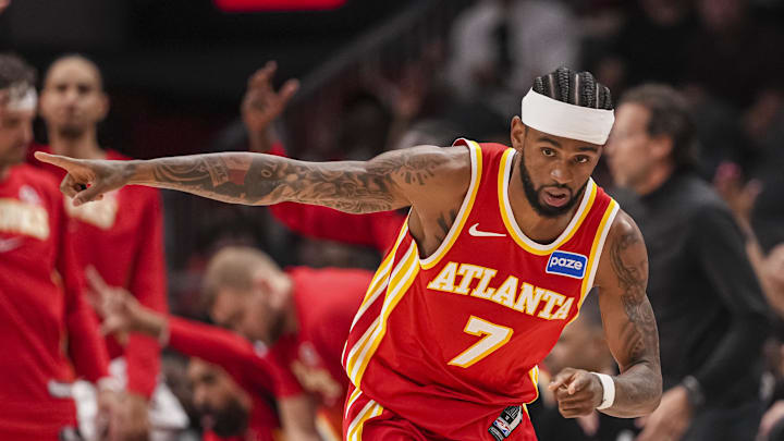 Mar 23, 2026; Atlanta, Georgia, USA; Atlanta Hawks guard Nickeil Alexander-Walker (7) reacts after making a three point basket against the Memphis Grizzlies during the first half at State Farm Arena. Mandatory Credit: Dale Zanine-Imagn Images