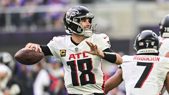 Dec 8, 2024; Minneapolis, Minnesota, USA; Atlanta Falcons quarterback Kirk Cousins (18) throws a pass against the Minnesota Vikings during the second quarter at U.S. Bank Stadium. Mandatory Credit: Jeffrey Becker-Imagn Images