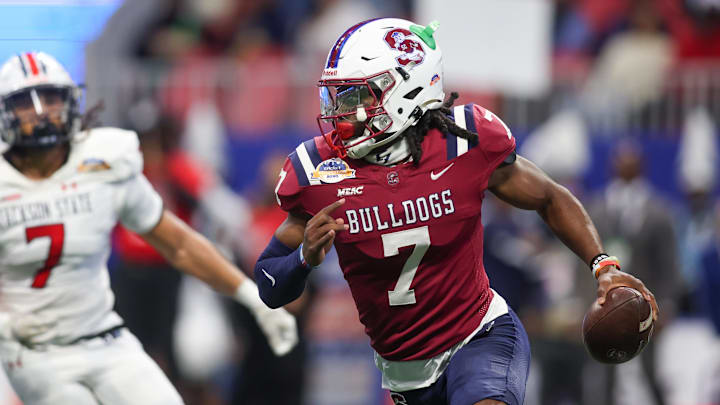 Dec 14, 2024; Atlanta, GA, USA; South Carolina State Bulldogs quarterback Eric Phoenix (7) scrambles against the Jackson State Tigers in the second quarter at Mercedes-Benz Stadium. Mandatory Credit: Brett Davis-Imagn Images Dec 14, 2024; Atlanta, GA, USA; South Carolina State Bulldogs quarterback Eric Phoenix (7) scrambles against the Jackson State Tigers in the second quarter at Mercedes-Benz Stadium. Mandatory Credit: Brett Davis-Imagn Images