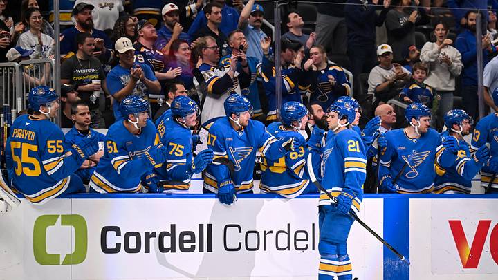 Apr 14, 2026; St. Louis, Missouri, USA; St. Louis Blues right wing Jimmy Snuggerud (21) celebrates with teammates after scoring a goal against the Pittsburgh Penguins during the first period at Enterprise Center. Mandatory Credit: Connor Hamilton-Imagn Images