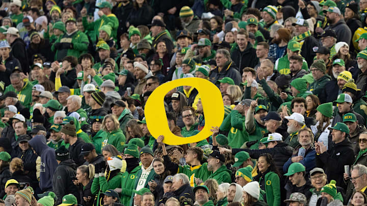 Oregon fans cheer the Ducks during the first half against James Madison at Autzen Stadium in Eugene Dec. 20, 2025.