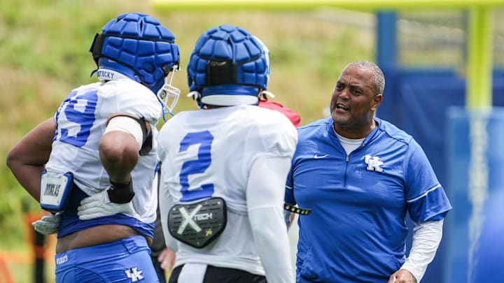Kentucky defensive lineman coach Anwar Stewart reacts during practice Friday. August 2, 2024 in Lexington.