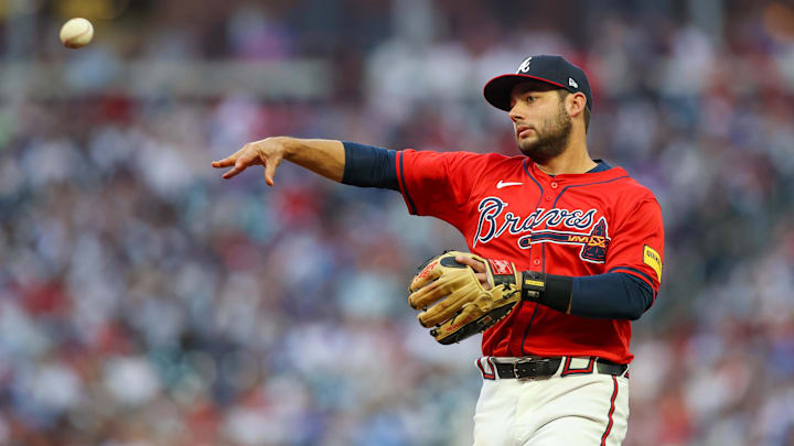 Apr 19, 2024; Atlanta, Georgia, USA; Atlanta Braves shortstop David Fletcher (22) throws a runner