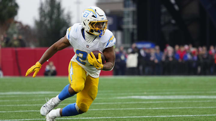 Former Los Angeles Chargers running back J.K. Dobbins (27) runs with the ball against the New England Patriots during the second half at Gillette Stadium. Former Los Angeles Chargers running back J.K. Dobbins (27) runs with the ball against the New England Patriots during the second half at Gillette Stadium.