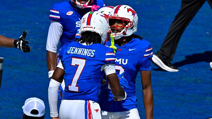 Sep 12, 2026; Dallas, Texas, USA; SMU Mustangs quarterback Kevin Jennings (7) and wide receiver Jalen Hale (2) celebrates a touchdown during the game between the Mustangs and the Aggies at Gerald J. Ford Stadium. Mandatory Credit: Jerome Miron-Imagn Images Sep 12, 2026; Dallas, Texas, USA; SMU Mustangs quarterback Kevin Jennings (7) and wide receiver Jalen Hale (2) celebrates a touchdown during the game between the Mustangs and the Aggies at Gerald J. Ford Stadium. Mandatory Credit: Jerome Miron-Imagn Images
