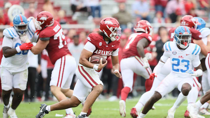Nov 2, 2024; Fayetteville, Arkansas, USA; Arkansas Razorbacks quarterback Malachi Singleton (3) rushes in the fourth quarter against the Ole Miss Rebels at Donald W. Reynolds Razorback Stadium. Mississippi won 63-31. Mandatory Credit: Nelson Chenault-Imagn Images