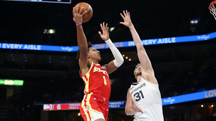 Oct 11, 2025; Memphis, Tennessee, USA; Atlanta Hawks forward Jalen Johnson (1) shoots as Memphis Grizzlies center Jock Landale (31) defends during the first quarter at FedExForum. Mandatory Credit: Petre Thomas-Imagn Images Oct 11, 2025; Memphis, Tennessee, USA; Atlanta Hawks forward Jalen Johnson (1) shoots as Memphis Grizzlies center Jock Landale (31) defends during the first quarter at FedExForum. Mandatory Credit: Petre Thomas-Imagn Images