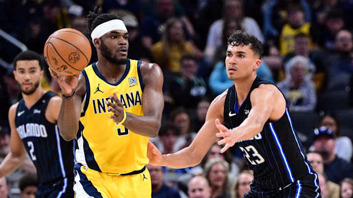 Apr 11, 2025; Indianapolis, Indiana, USA; Indiana Pacers forward Jarace Walker (5) passes the ball away from Orlando Magic forward Tristan da Silva (23) during the second half at Gainbridge Fieldhouse. Mandatory Credit: Marc Lebryk-Imagn Images Apr 11, 2025; Indianapolis, Indiana, USA; Indiana Pacers forward Jarace Walker (5) passes the ball away from Orlando Magic forward Tristan da Silva (23) during the second half at Gainbridge Fieldhouse. Mandatory Credit: Marc Lebryk-Imagn Images