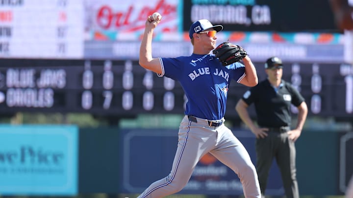 Toronto Blue Jays infielder Josh Kasevich throws the ball for an out. 