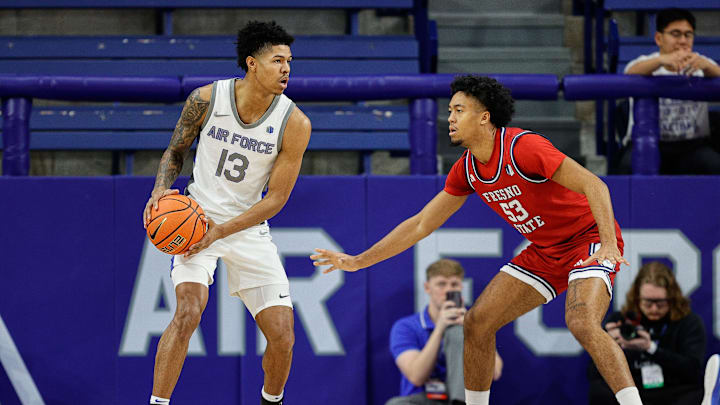 Feb 10, 2024; Colorado Springs, Colorado, USA; Air Force Falcons forward Chase Beasley (13) controls