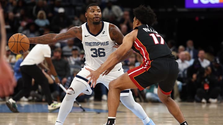 Oct 18, 2024; Memphis, Tennessee, USA; Memphis Grizzlies guard Marcus Smart (36) passes the ball as Miami Heat guard Zyon Pullin (17) defends during the second half at FedExForum. Oct 18, 2024; Memphis, Tennessee, USA; Memphis Grizzlies guard Marcus Smart (36) passes the ball as Miami Heat guard Zyon Pullin (17) defends during the second half at FedExForum.