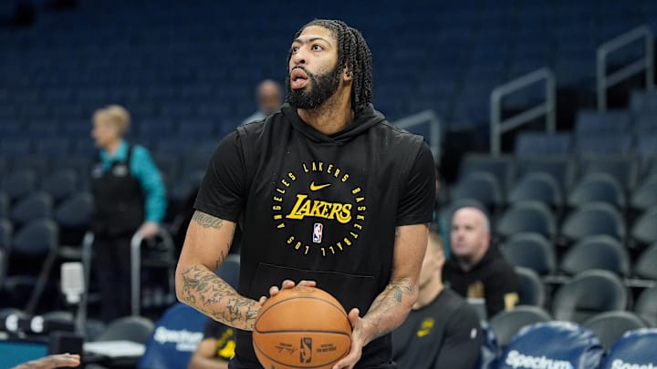 Jan 27, 2025; Charlotte, North Carolina, USA; Los Angeles Lakers forward Anthony Davis (3) shoots  during pregame warm ups at the Spectrum Center. Mandatory Credit: Jim Dedmon-Imagn Images