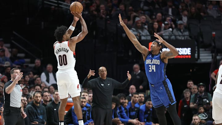 Jan 30, 2025; Portland, Oregon, USA: Portland Trail Blazers guard Scoot Henderson (00) shoots the ball over Orlando Magic center Wendell Carter Jr. (34) in the second half at Moda Center. Mandatory Credit: Jaime Valdez-Imagn Images