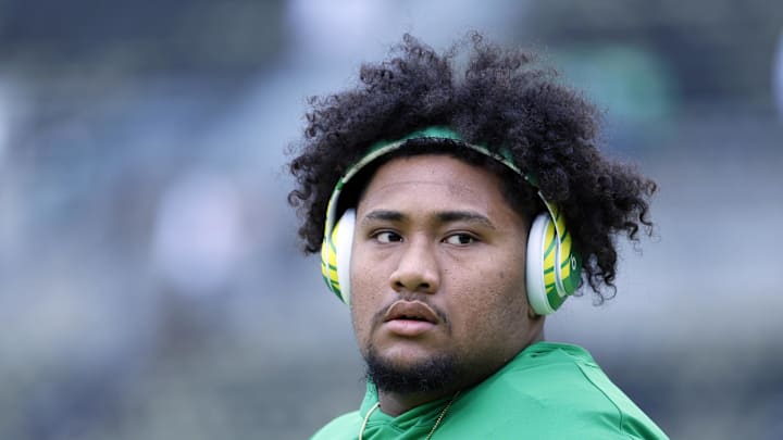 Oct 21, 2023; Eugene, Oregon, USA; Oregon Ducks offensive lineman Iapani Laloulu (72)  looks on during warm-ups prior to the game against the Washington State Cougars at Autzen Stadium. Mandatory Credit: Soobum Im-Imagn Images