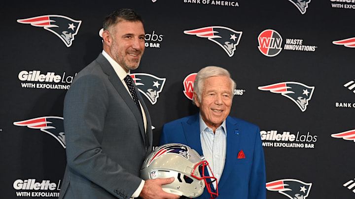Jan 13, 2025; Foxborough, MA, USA; Mike Vrabel (left) poses for a photo with New England Patriots owner Robert Kraft (right) after a press conference at Gillette Stadium to introduce him as the Patriots new head coach. Mandatory Credit: Eric Canha-Imagn Images