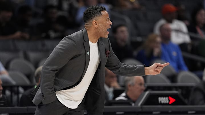 Mar 12, 2025; Charlotte, NC, USA; Georgia Tech Yellow Jackets head coach Damon Stoudamire calls to his team during the first half against the Virginia Cavaliers at Spectrum Center. Mandatory Credit: Jim Dedmon-Imagn Images
