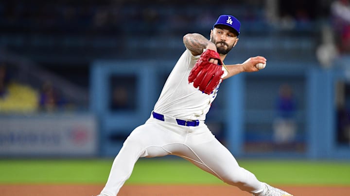 Jul 21, 2025; Los Angeles, California, USA; Los Angeles Dodgers pitcher Tanner Scott (66) throws against the Minnesota Twins during the eighth inning at Dodger Stadium. Mandatory Credit: Gary A. Vasquez-Imagn Images