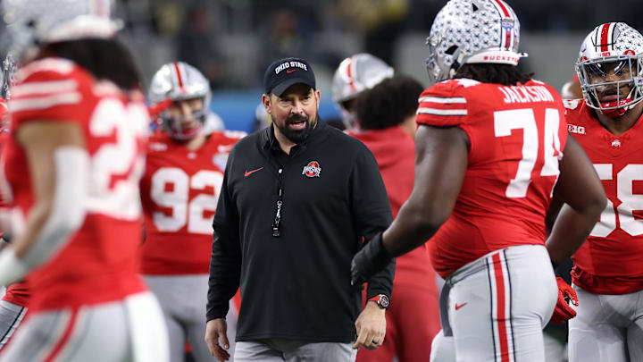 Dec 29, 2023; Arlington, TX, USA;  Ohio State Buckeyes head coach Ryan Day walks on the field before