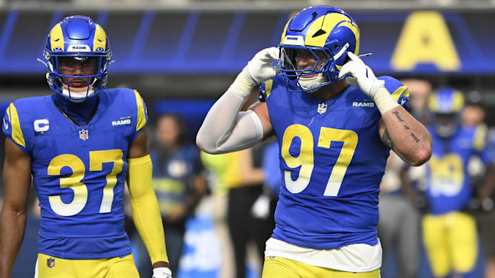 Oct 20, 2024; Inglewood, California, USA; Los Angeles Rams linebacker Michael Hoecht (97) and Los Angeles Rams safety Quentin Lake (37) during an NFL game against the Las Vegas Raiders at SoFi Stadium. Mandatory Credit: Robert Hanashiro-Imagn Images