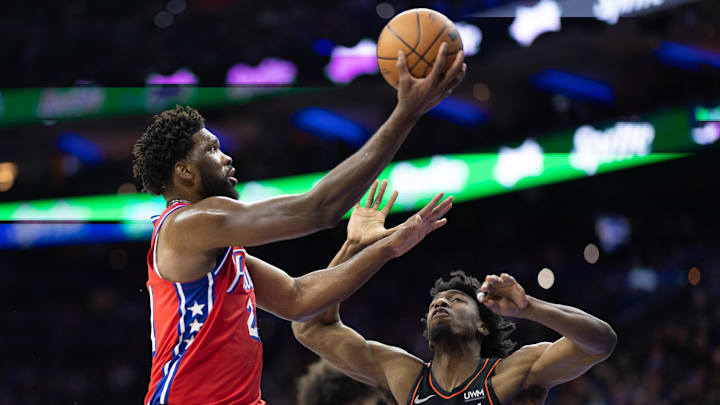 Dec 15, 2023; Philadelphia, Pennsylvania, USA; Philadelphia 76ers center Joel Embiid (21) drives for
