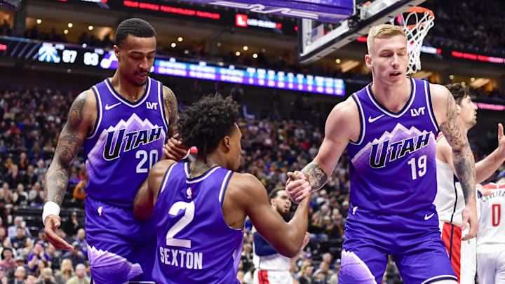 Mar 4, 2024; Salt Lake City, Utah, USA; Utah Jazz forward/center John Collins (20) and forward Luka