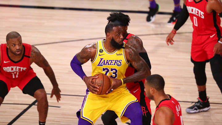 Sep 10, 2020; Lake Buena Vista, Florida, USA; Los Angeles Lakers forward LeBron James (23) drives against the Houston Rockets in the first half in game four of the second round of the 2020 NBA Playoffs at AdventHealth Arena. Mandatory Credit: Kim Klement-Imagn Images
