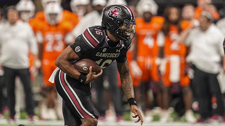 Aug 31, 2025; Atlanta, Georgia, USA; South Carolina Gamecocks quarterback LaNorris Sellers (16) runs for a touchdown against the Virginia Tech Hokies during the first quarter at Mercedes-Benz Stadium. Mandatory Credit: Dale Zanine-Imagn Images