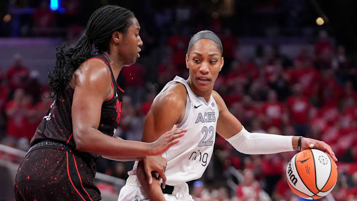 Indiana Fever forward Aliyah Boston (7) defends Las Vegas Aces center A'ja Wilson (22) during Game 4 of the WNBA semifinals on Sunday, Sept. 28, 2025, at Gainbridge Fieldhouse in Indianapolis.