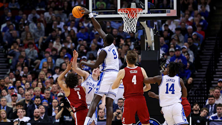 Duke Blue Devils center Khaman Maluach (9) blocks the shot of Alabama Crimson Tide guard Mark Sears (1)