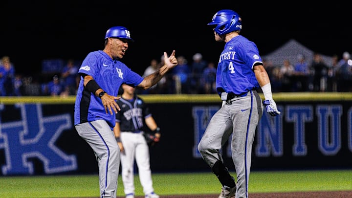 Kentucky Wildcats head coach Nick Mingione celebrates with infielder Émilien Pitre Kentucky Wildcats head coach Nick Mingione celebrates with infielder Émilien Pitre