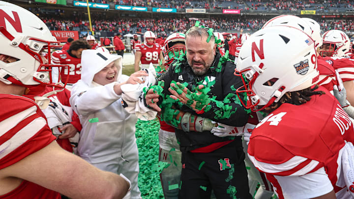Dec 28, 2024; Bronx, NY, USA; Nebraska Cornhuskers head coach Matt Rhule celebrates with his team after the game against the Boston College Eagles at Yankee Stadium. Mandatory Credit: Vincent Carchietta-Imagn Images