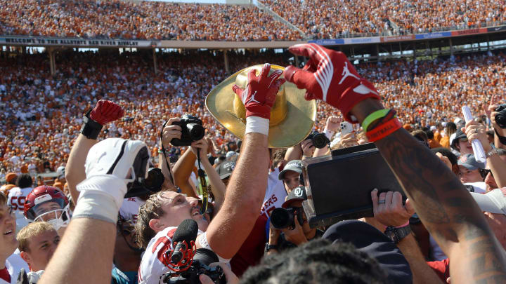 Oklahoma Sooners linebacker Danny Stutsman (28) celebrates with the Golden Hat Trophy after the Red River Rivalry college football game between the University of Oklahoma Sooners (OU) and the University of Texas (UT) Longhorns at the Cotton Bowl in Dallas, Saturday, Oct. 7, 2023. Oklahoma won 34-30. Oklahoma Sooners linebacker Danny Stutsman (28) celebrates with the Golden Hat Trophy after the Red River Rivalry college football game between the University of Oklahoma Sooners (OU) and the University of Texas (UT) Longhorns at the Cotton Bowl in Dallas, Saturday, Oct. 7, 2023. Oklahoma won 34-30.