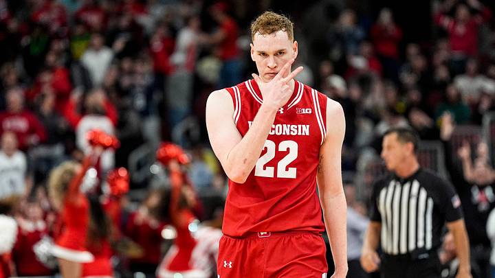 Wisconsin forward Austin Rapp (22) celebrates a 3-pointer against Michigan during the second half of Big Ten Tournament semifinal at United Center in Chicago on Saturday, March 14, 2026.