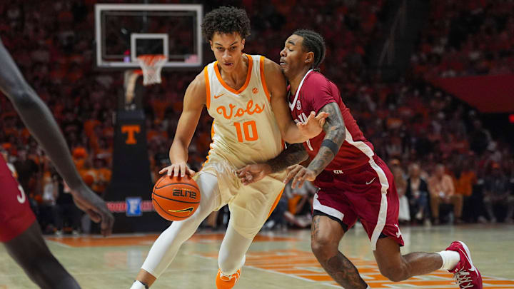 Tennessee forward Nate Ament (10) dribbles the ball past Alabama guard Labaron Philon Jr. (0) during a NCAA basketball game between Tennessee and Alabama at Thompson-Boling Arena at Food City Center in Knoxville, Tenn., on Feb. 28, 2026. Tennessee forward Nate Ament (10) dribbles the ball past Alabama guard Labaron Philon Jr. (0) during a NCAA basketball game between Tennessee and Alabama at Thompson-Boling Arena at Food City Center in Knoxville, Tenn., on Feb. 28, 2026.