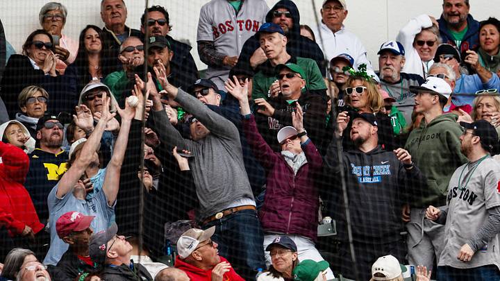 Fans react as a ball goes foul during a spring training game between the Boston Red Sox and the Atlanta Braves at JetBlue Park or Fenway South in Fort Myers on Tuesday, March 17, 2026. Fans react as a ball goes foul during a spring training game between the Boston Red Sox and the Atlanta Braves at JetBlue Park or Fenway South in Fort Myers on Tuesday, March 17, 2026.