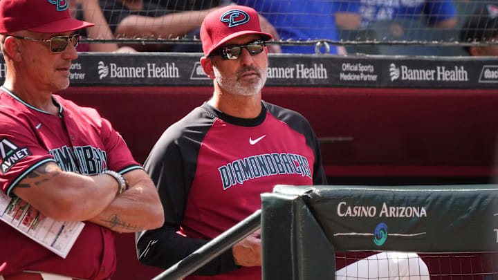 Arizona Diamondbacks manager Torey Lovullo watches his team from the dugout as they play against the Chicago Cubs at Chase Field in Phoenix on Sunday, March 30, 2025.