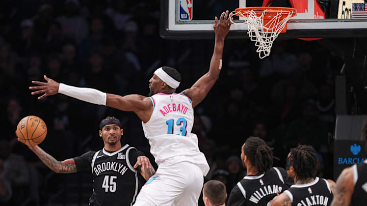Feb 7, 2025; Brooklyn, New York, USA; Brooklyn Nets guard Keon Johnson (45) passes the ball as Miami Heat center Bam Adebayo (13) defends during the second half at Barclays Center. Mandatory Credit: Vincent Carchietta-Imagn Images Feb 7, 2025; Brooklyn, New York, USA; Brooklyn Nets guard Keon Johnson (45) passes the ball as Miami Heat center Bam Adebayo (13) defends during the second half at Barclays Center. Mandatory Credit: Vincent Carchietta-Imagn Images