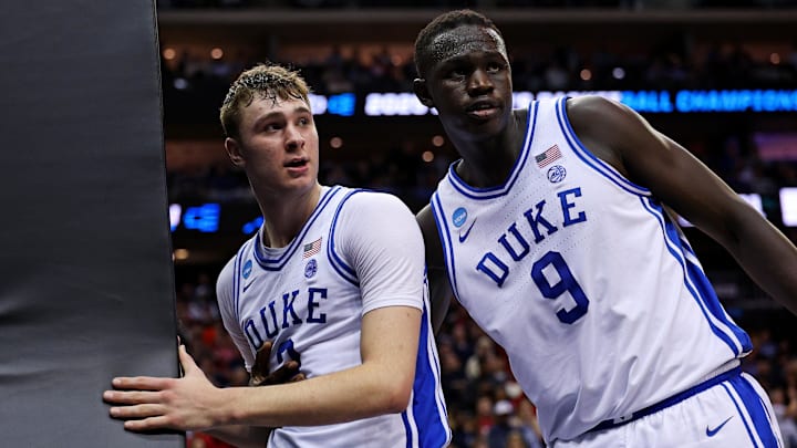 Mar 27, 2025; Newark, NJ, USA; Duke Blue Devils forward Cooper Flagg (2) reacts with center Khaman Maluach (9) during the second half against the Arizona Wildcats during an East Regional semifinal of the 2025 NCAA tournament at Prudential Center. Mandatory Credit: Vincent Carchietta-Imagn Images