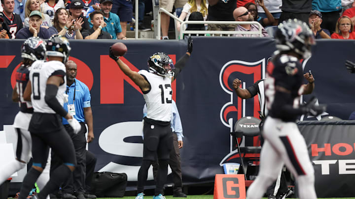 Sep 29, 2024; Houston, Texas, USA; Jacksonville Jaguars wide receiver Christian Kirk (13) reacts to his touchdown against the Houston Texans in the second half at NRG Stadium. Mandatory Credit: Thomas Shea-Imagn Images