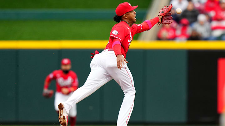 Cincinnati Reds shortstop Jose Barrero (2) is unable to reach a ground ball.