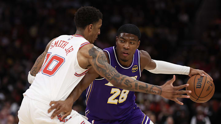 Mar 18, 2026; Houston, Texas, USA;  Los Angeles Lakers forward Rui Hachimura (28) dribbles against Houston Rockets forward Jabari Smith Jr. (10) in the second half at Toyota Center. Mandatory Credit: Thomas Shea-Imagn Images