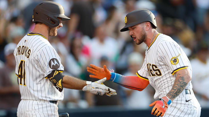 Jul 12, 2025; San Diego, California, USA; San Diego Padres center fielder Jackson Merrill (3) celebrates with designated hitter Trenton Brooks (41) after hitting a home run during the sixth inning against the Philadelphia Phillies at Petco Park. Mandatory Credit: David Frerker-Imagn Images