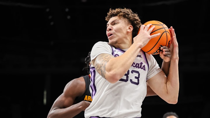Mar 11, 2025; Kansas City, MO, USA; Kansas State Wildcats guard Coleman Hawkins (33) drives to the basket during the first half against the Arizona State Sun Devils at T-Mobile Center. Mandatory Credit: William Purnell-Imagn Images Mar 11, 2025; Kansas City, MO, USA; Kansas State Wildcats guard Coleman Hawkins (33) drives to the basket during the first half against the Arizona State Sun Devils at T-Mobile Center. Mandatory Credit: William Purnell-Imagn Images