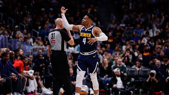 Dec 13, 2024; Denver, Colorado, USA; Denver Nuggets guard Russell Westbrook (4) reacts after a play in the fourth quarter against the Los Angeles Clippers at Ball Arena. 