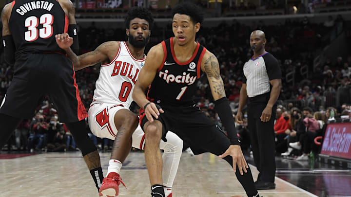 Jan 30, 2022; Chicago, Illinois, USA; Portland Trail Blazers guard Anfernee Simons (1) dribbles the ball against Chicago Bulls guard Coby White (0) during the second half at the United Center. Mandatory Credit: Matt Marton-Imagn Images Jan 30, 2022; Chicago, Illinois, USA; Portland Trail Blazers guard Anfernee Simons (1) dribbles the ball against Chicago Bulls guard Coby White (0) during the second half at the United Center. Mandatory Credit: Matt Marton-Imagn Images